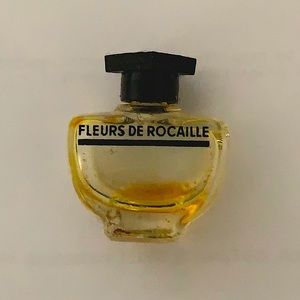CARON, FLEUR DE ROCAILLE EMPTY MINI BOTTLE. COLLECTIBLE